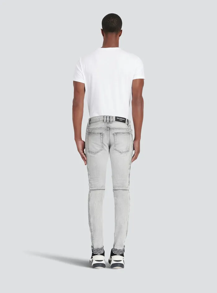 Balmain Denim Mens Slim Cut Faded And Ridged Light Gray Cotton Jeans With Balmain Monogram On Hem Grey Balmain Denim Mens Slim Cut Faded And Ridged Light Gray Cotton Jeans With Balmain Monogram On Hem Grey