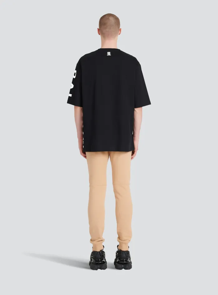Balmain TShirts Mens Oversized EcoDesigned Cotton TShirt With Balmain Logo Print Black Balmain TShirts Mens Oversized EcoDesigned Cotton TShirt With Balmain Logo Print Black