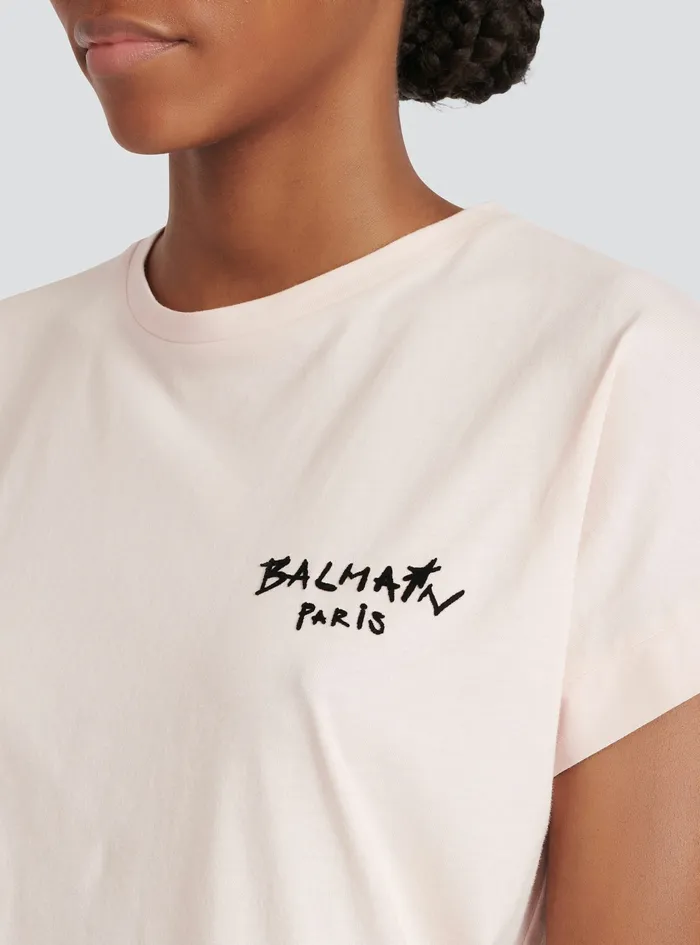 Balmain TShirts Womens Cotton TShirt With Small Flocked Graffiti Balmain Logo Pink Balmain TShirts Womens Cotton TShirt With Small Flocked Graffiti Balmain Logo Pink