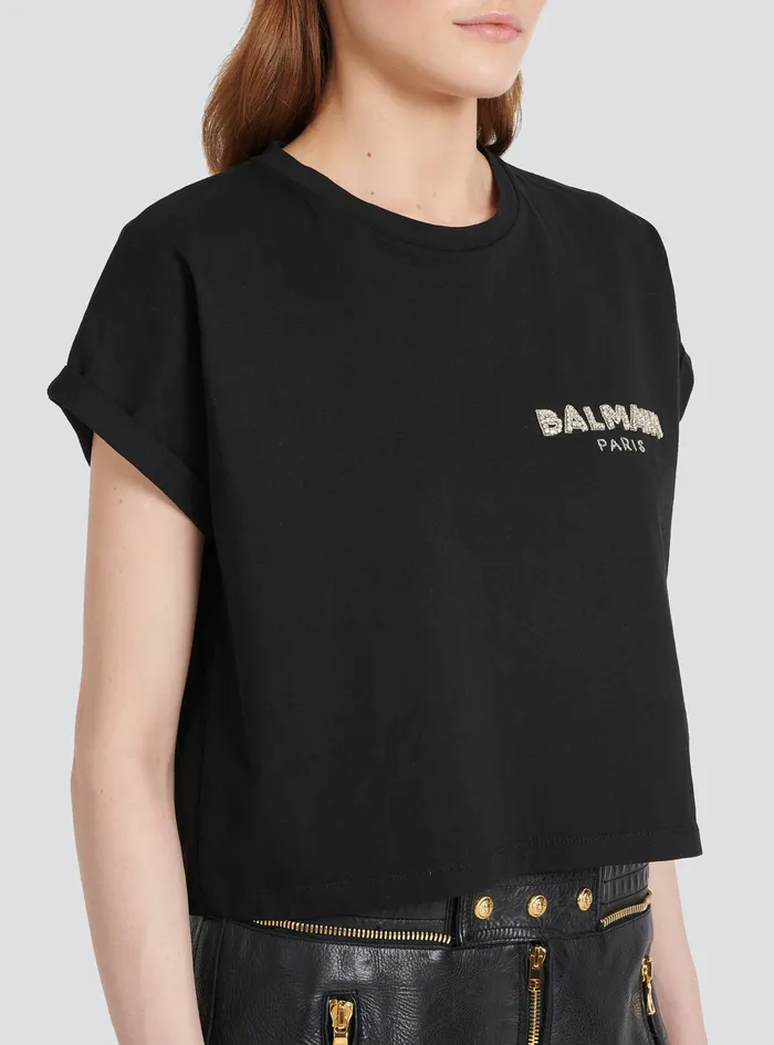 Balmain TShirts Womens Cropped Cotton TShirt With Small Flocked Balmain Logo Black Balmain TShirts Womens Cropped Cotton TShirt With Small Flocked Balmain Logo Black
