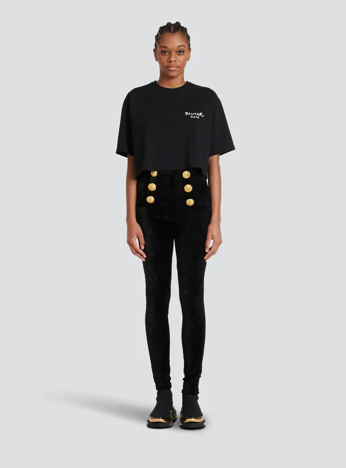 Balmain TShirts Womens Cropped Cotton TShirt With Small Flocked Graffiti Balmain Logo Black Balmain TShirts Womens Cropped Cotton TShirt With Small Flocked Graffiti Balmain Logo Black