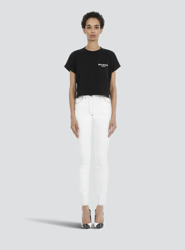 Balmain TShirts Womens Cropped EcoDesigned Cotton TShirt With Small Flocked Balmain Logo Black Balmain TShirts Womens Cropped EcoDesigned Cotton TShirt With Small Flocked Balmain Logo Black