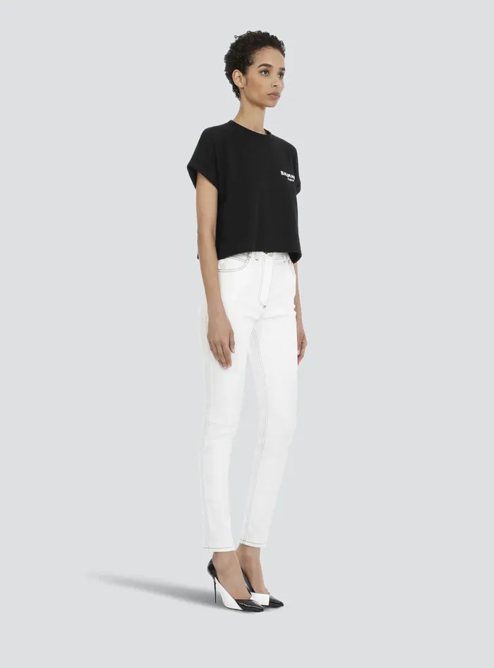 Balmain TShirts Womens Cropped EcoDesigned Cotton TShirt With Small Flocked Balmain Logo Black Balmain TShirts Womens Cropped EcoDesigned Cotton TShirt With Small Flocked Balmain Logo Black