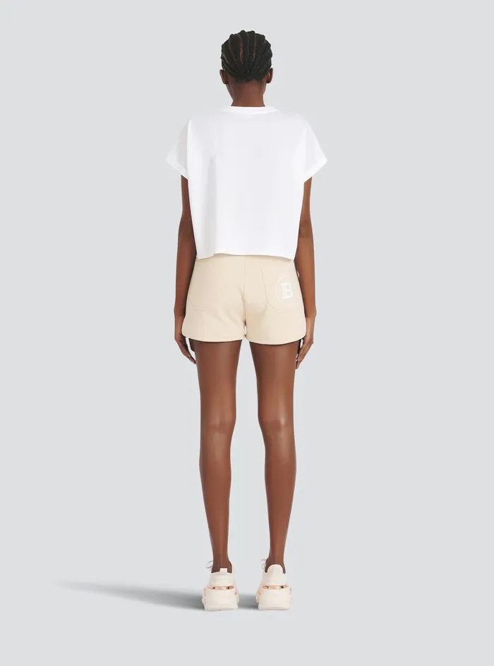 Balmain TShirts Womens Exclusive 8211 Cropped Cotton TShirt With Small Balmain Paris Logo White Balmain TShirts Womens Exclusive 8211 Cropped Cotton TShirt With Small Balmain Paris Logo White