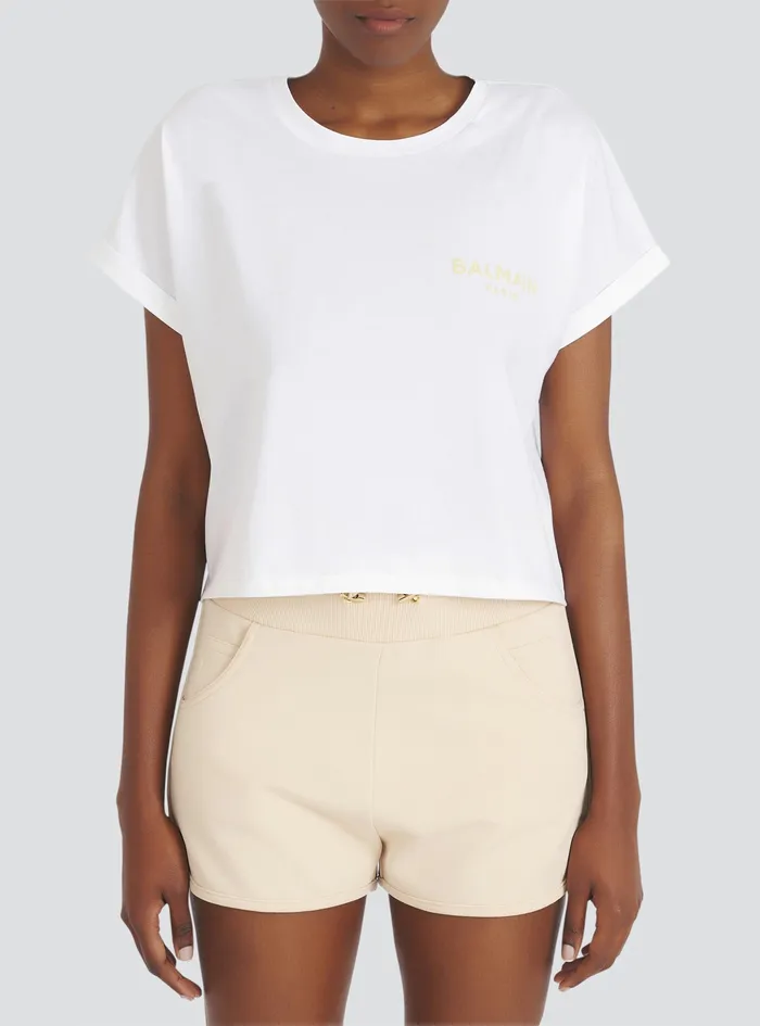 Balmain TShirts Womens Exclusive 8211 Cropped Cotton TShirt With Small Balmain Paris Logo White Balmain TShirts Womens Exclusive 8211 Cropped Cotton TShirt With Small Balmain Paris Logo White