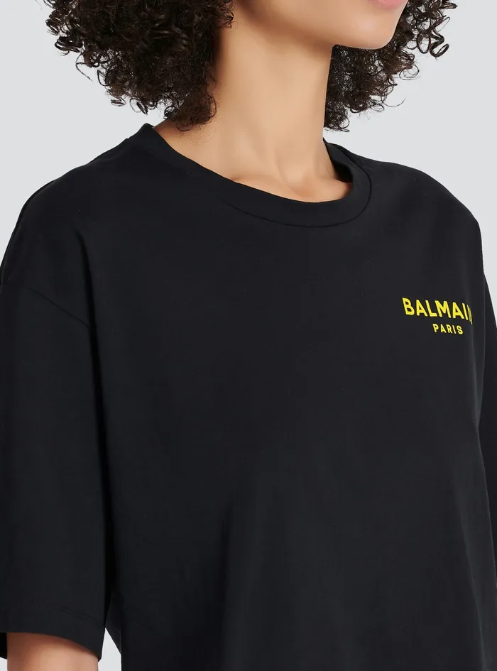 Balmain TShirts Womens X Netflix Cotton Cropped TShirt With Small Balmain Logo Print Black Balmain TShirts Womens X Netflix Cotton Cropped TShirt With Small Balmain Logo Print Black