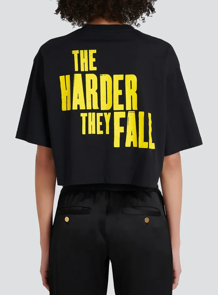 Balmain TShirts Womens X Netflix Cotton Cropped TShirt With Small Balmain Logo Print Black Balmain TShirts Womens X Netflix Cotton Cropped TShirt With Small Balmain Logo Print Black