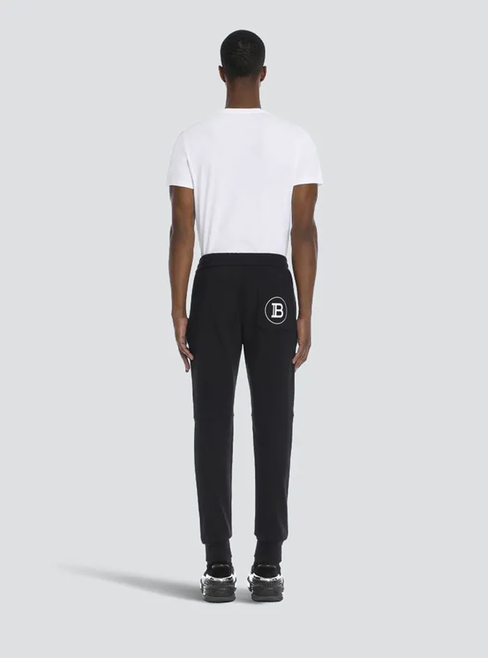 Balmain Trousers And Shorts Mens Cotton Sweatpants With Flocked Balmain Paris Logo Black Balmain Trousers And Shorts Mens Cotton Sweatpants With Flocked Balmain Paris Logo Black