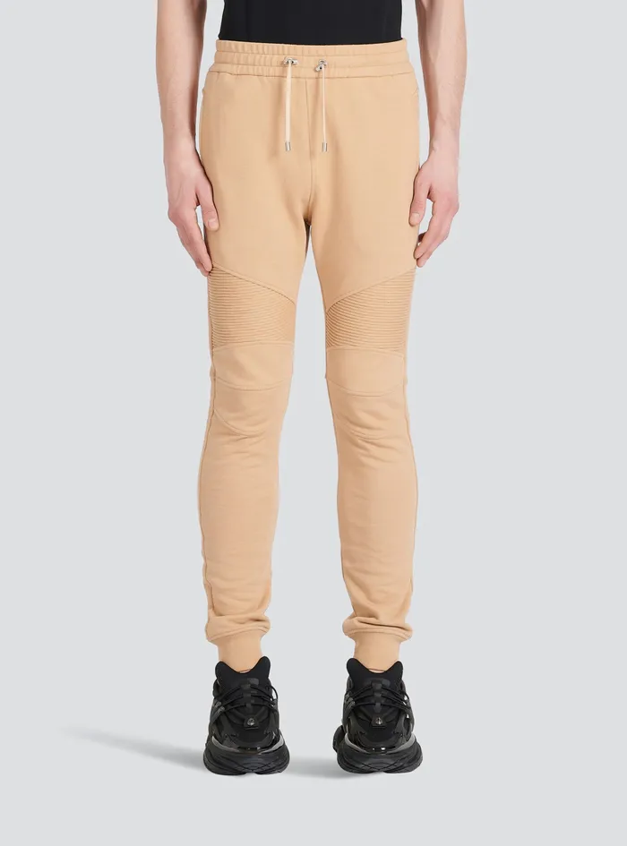 Balmain Trousers And Shorts Mens EcoDesigned Cotton Sweatpants With Black Balmain Logo Print Beige Balmain Trousers And Shorts Mens EcoDesigned Cotton Sweatpants With Black Balmain Logo Print Beige