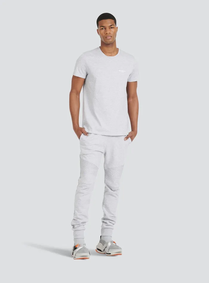 Balmain Trousers And Shorts Mens EcoDesigned Cotton Sweatpants With Flocked Balmain Paris Logo Grey Balmain Trousers And Shorts Mens EcoDesigned Cotton Sweatpants With Flocked Balmain Paris Logo Grey