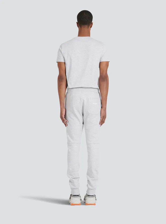 Balmain Trousers And Shorts Mens EcoDesigned Cotton Sweatpants With Flocked Balmain Paris Logo Grey Balmain Trousers And Shorts Mens EcoDesigned Cotton Sweatpants With Flocked Balmain Paris Logo Grey