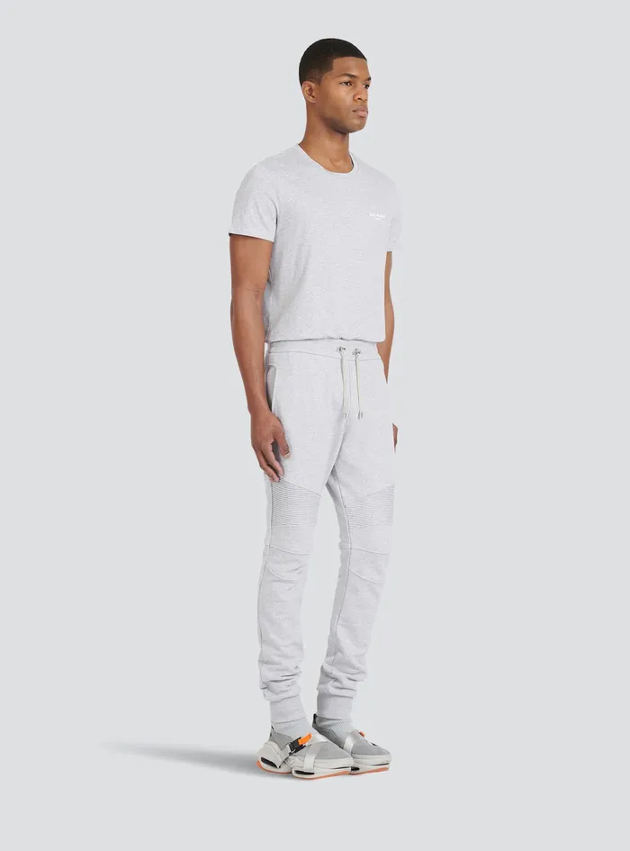 Balmain Trousers And Shorts Mens EcoDesigned Cotton Sweatpants With Flocked Balmain Paris Logo Grey Balmain Trousers And Shorts Mens EcoDesigned Cotton Sweatpants With Flocked Balmain Paris Logo Grey