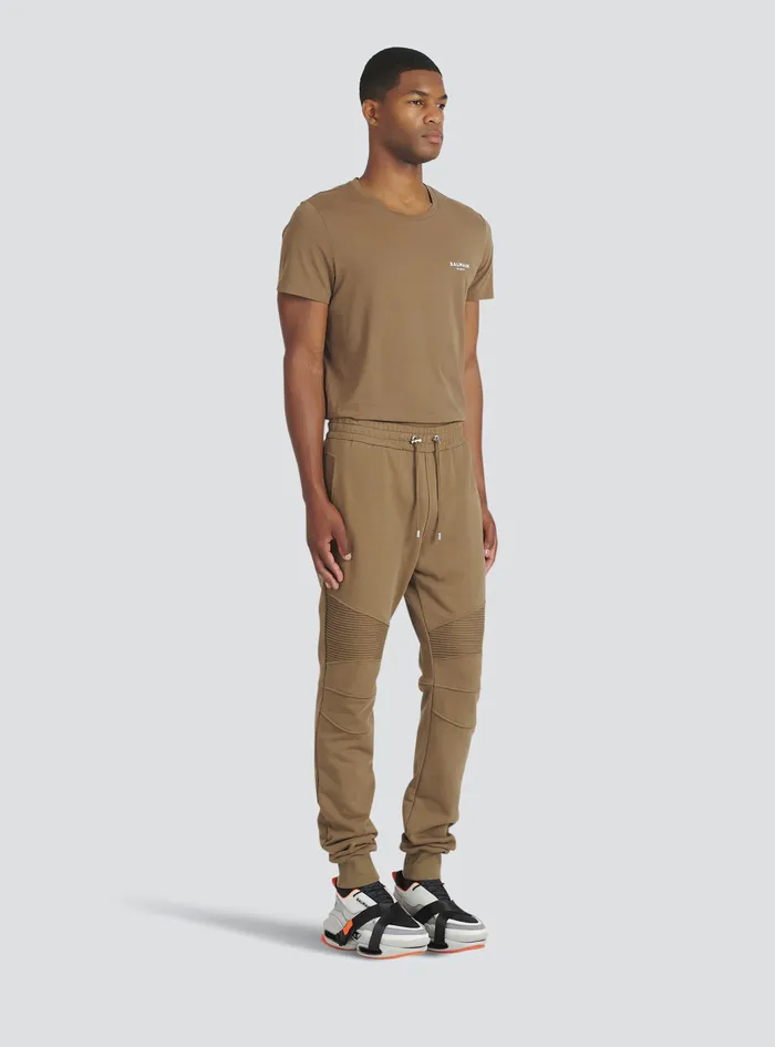 Balmain Trousers And Shorts Mens EcoDesigned Cotton Sweatpants With Flocked White Balmain Logo Brown Balmain Trousers And Shorts Mens EcoDesigned Cotton Sweatpants With Flocked White Balmain Logo Brown