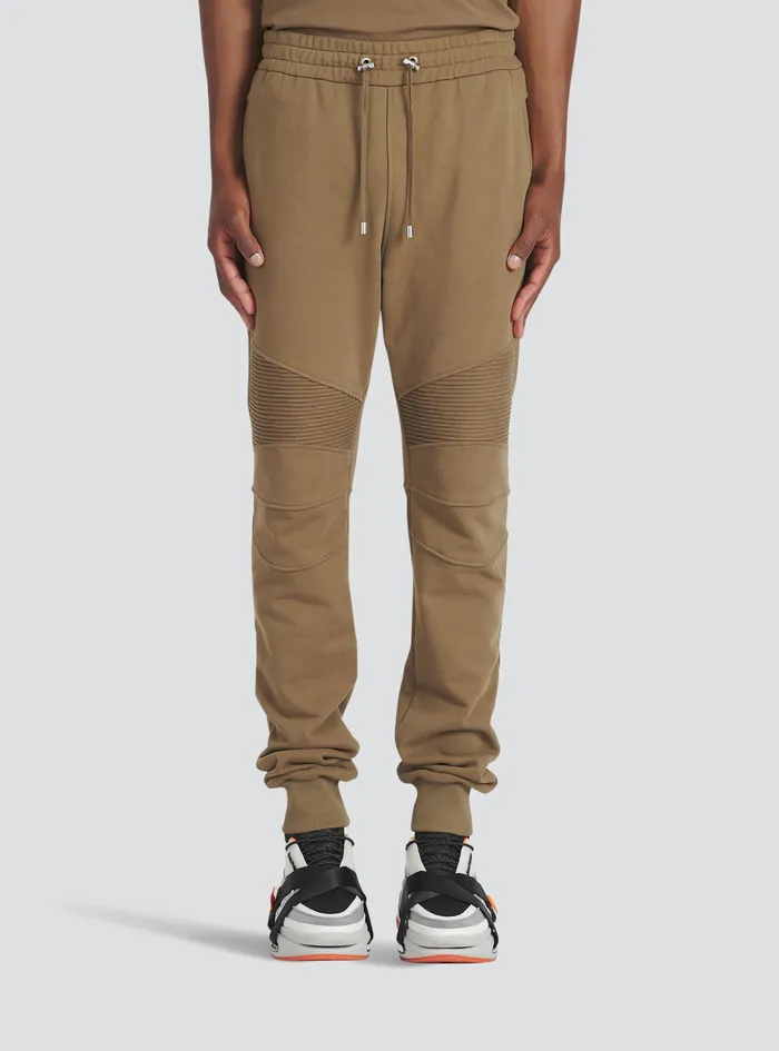 Balmain Trousers And Shorts Mens EcoDesigned Cotton Sweatpants With Flocked White Balmain Logo Brown Balmain Trousers And Shorts Mens EcoDesigned Cotton Sweatpants With Flocked White Balmain Logo Brown