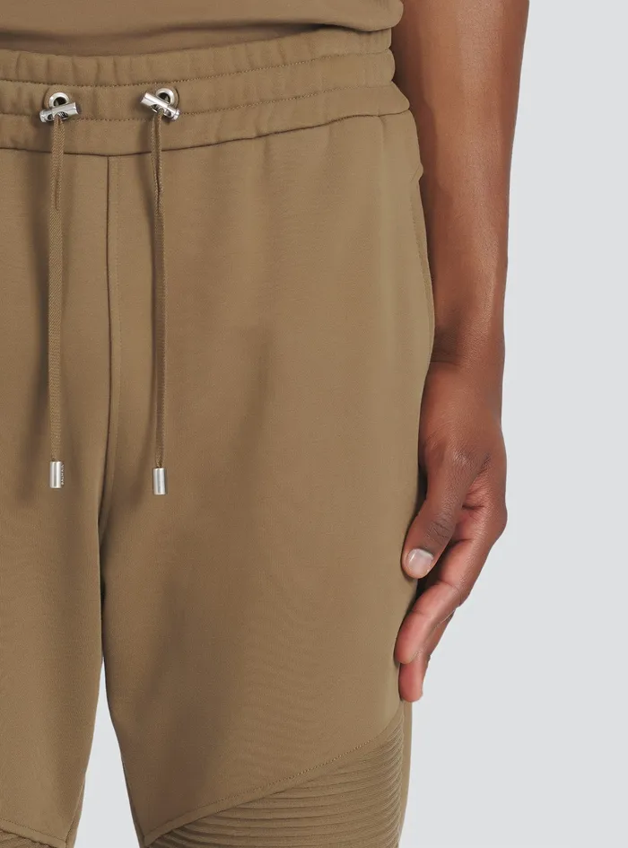 Balmain Trousers And Shorts Mens EcoDesigned Cotton Sweatpants With Flocked White Balmain Logo Brown Balmain Trousers And Shorts Mens EcoDesigned Cotton Sweatpants With Flocked White Balmain Logo Brown
