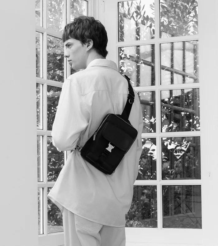 Le Tanneur Backpacks WomenMen Sling Satchel In Coated Canvas Black Brown