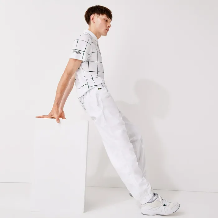 Pants and Shorts Lacoste Mens SPORT Performance Side Zip Track Pants White Shop Pants and Shorts Lacoste Mens SPORT Performance Side Zip Track Pants White Shop