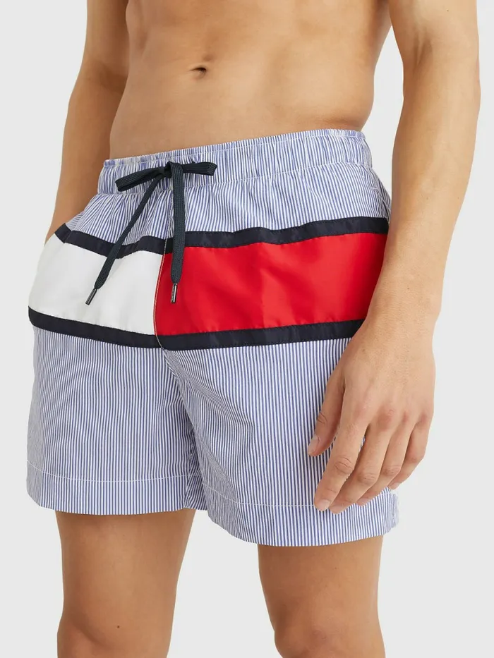 Tommy Hilfiger Ithaca Stripe ColourBlocked Mid Length Shorts Hilfiger Blue Stripe Mens Swimwear On Sale Tommy Hilfiger Ithaca Stripe ColourBlocked Mid Length Shorts Hilfiger Blue Stripe Mens Swimwear On Sale