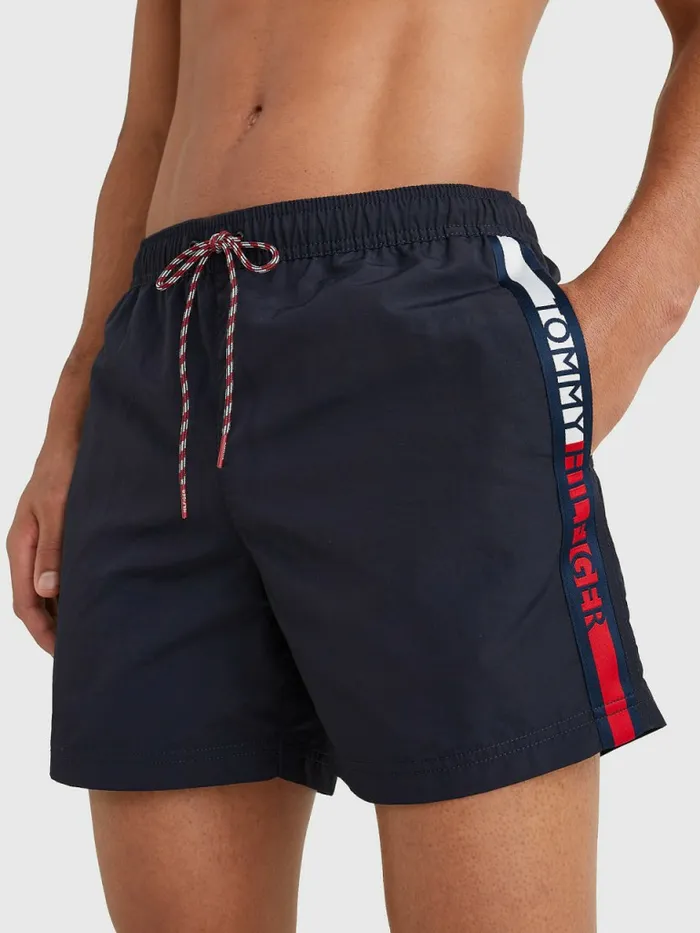 Tommy Hilfiger Logo Tape Mid Length Swim Shorts Desert Sky Mens Swimwear Popular Tommy Hilfiger Logo Tape Mid Length Swim Shorts Desert Sky Mens Swimwear Popular