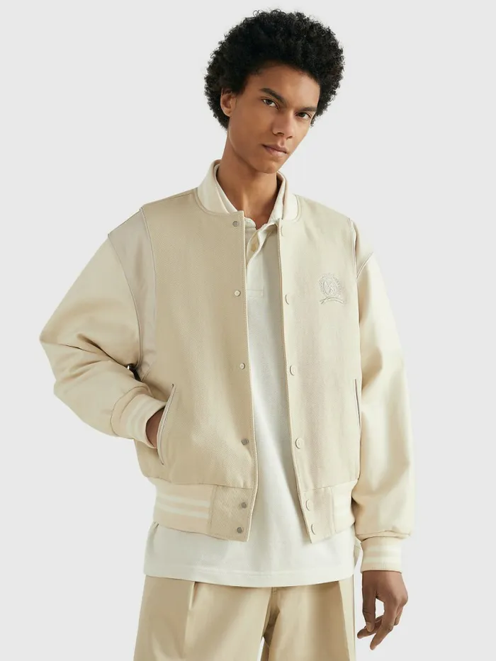 Tommy Hilfiger Prep Crest Mixed Texture Varsity Jacket Classic BeigeDesert Sand Dune Mens Coats and Jackets Casaul Tommy Hilfiger Prep Crest Mixed Texture Varsity Jacket Classic BeigeDesert Sand Dune Mens Coats and Jackets Casaul